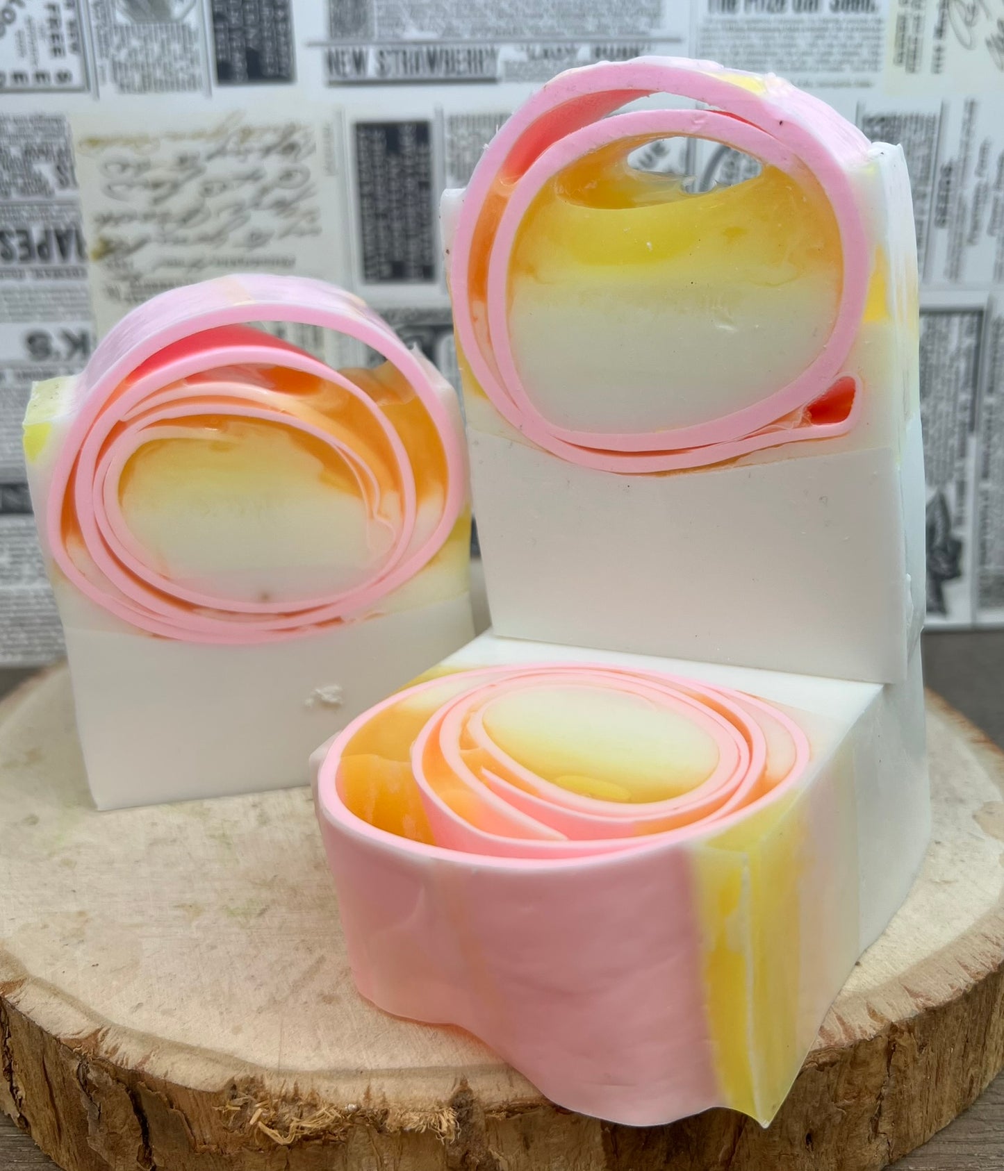 Pink grapefruit goat milk soap bar from The Bubble Bath Shop, showing a fresh, fragrant soap with pink grapefruit slices.