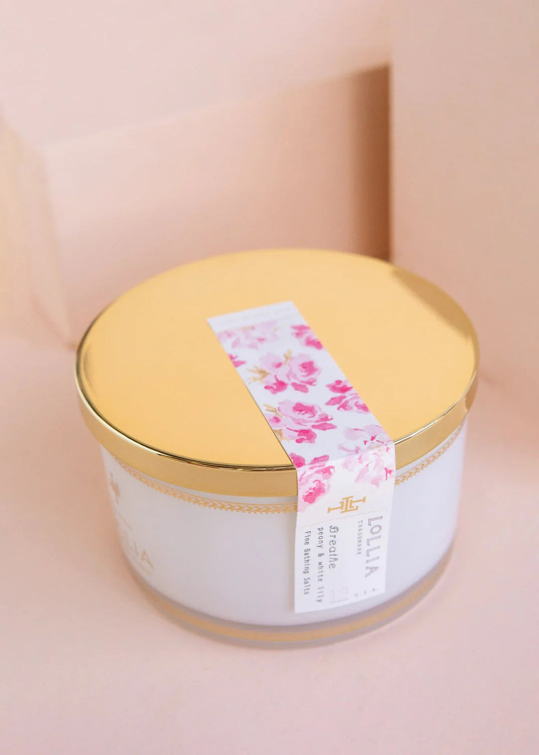 Lollia Breathe bath salts by Margot Elena, in a clear container with aromatic salt crystals and floral accents for relaxing baths.