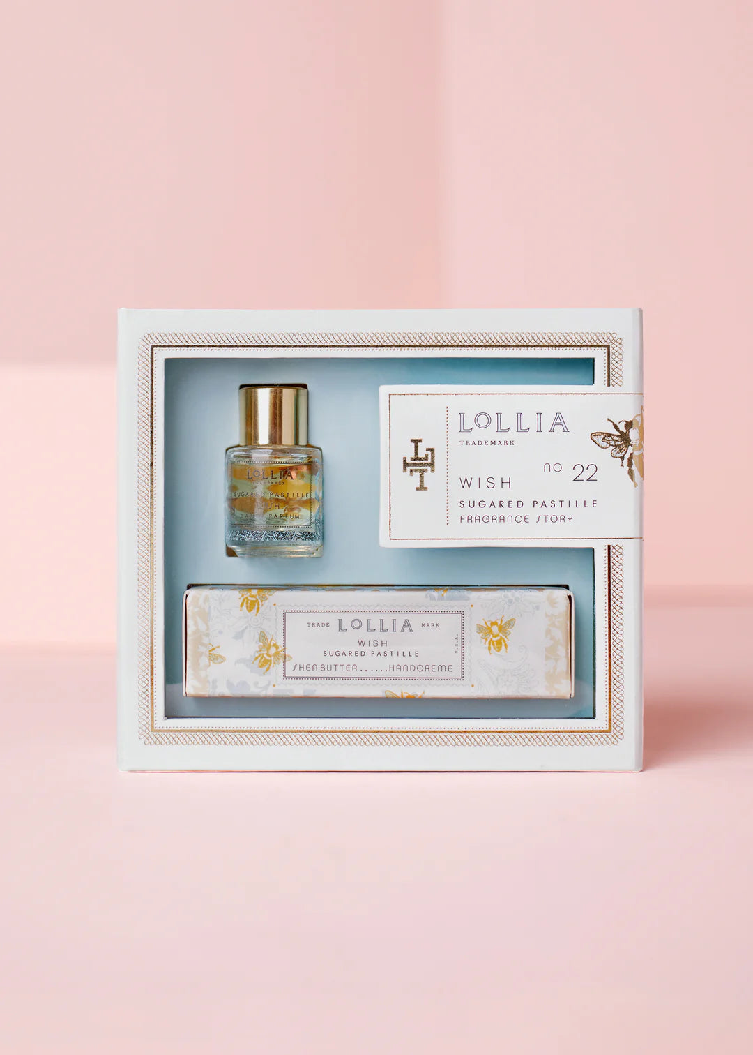 The Margot Elena Wish Fragrance Story Gift Set is a luxurious duo featuring a petite Eau de Parfum and a Shea Butter Handcreme, both infused with the enchanting 'Wish' fragrance—a warm blend of vanilla, jasmine, and amber. Front