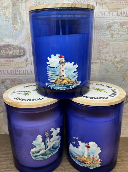 Ocean Narcissist Candle front Blue glass Jar
with Light houses