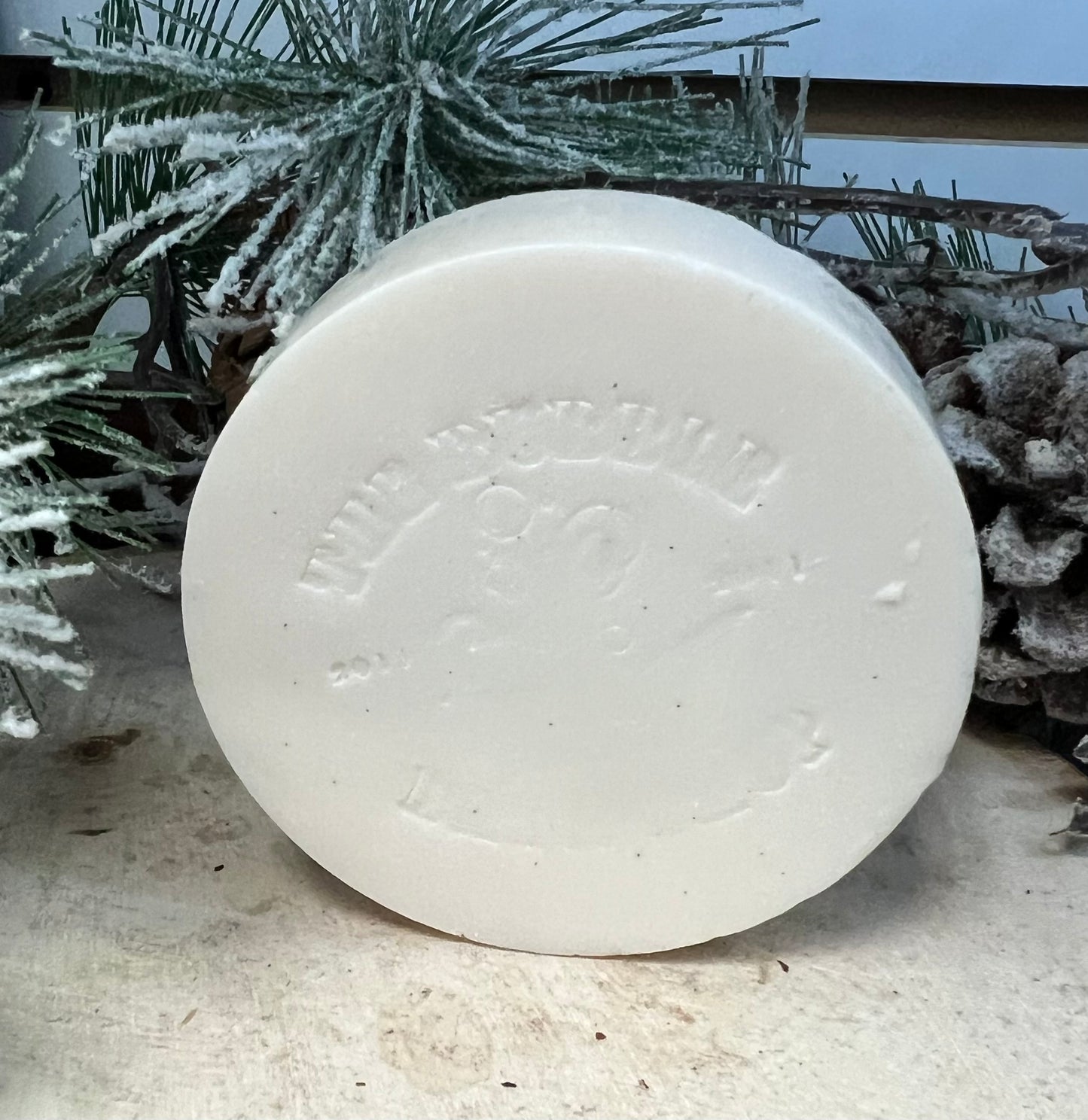 Bar of goat milk soap with lemongrass and lime scent, showcasing a natural, fresh presentation from The Bubble Bath Shop.