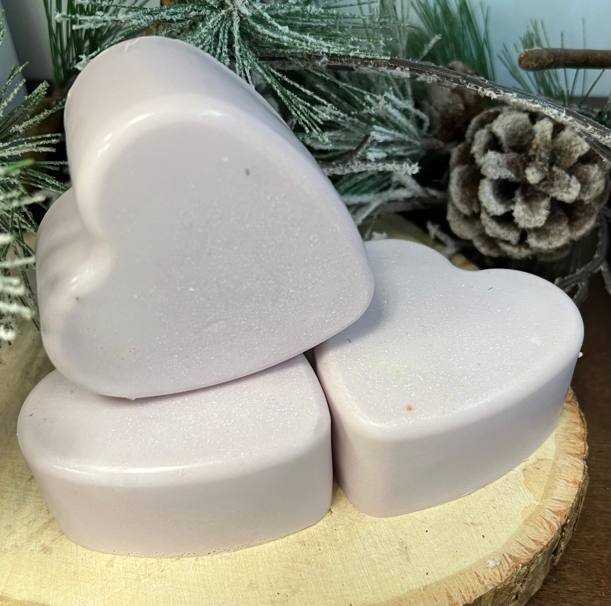 Heart-shaped Gardenia scented goat milk soap from THE BUBBLE BATH SHOP, 4 oz, with a creamy texture and floral scent.