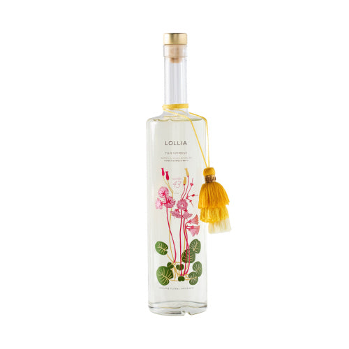 Lollia's "This Moment" Bubble Bath, crafted by Margot Elena, offers a luxurious bathing experience with uplifting notes of Water Lily and Sun Blossoms. Front